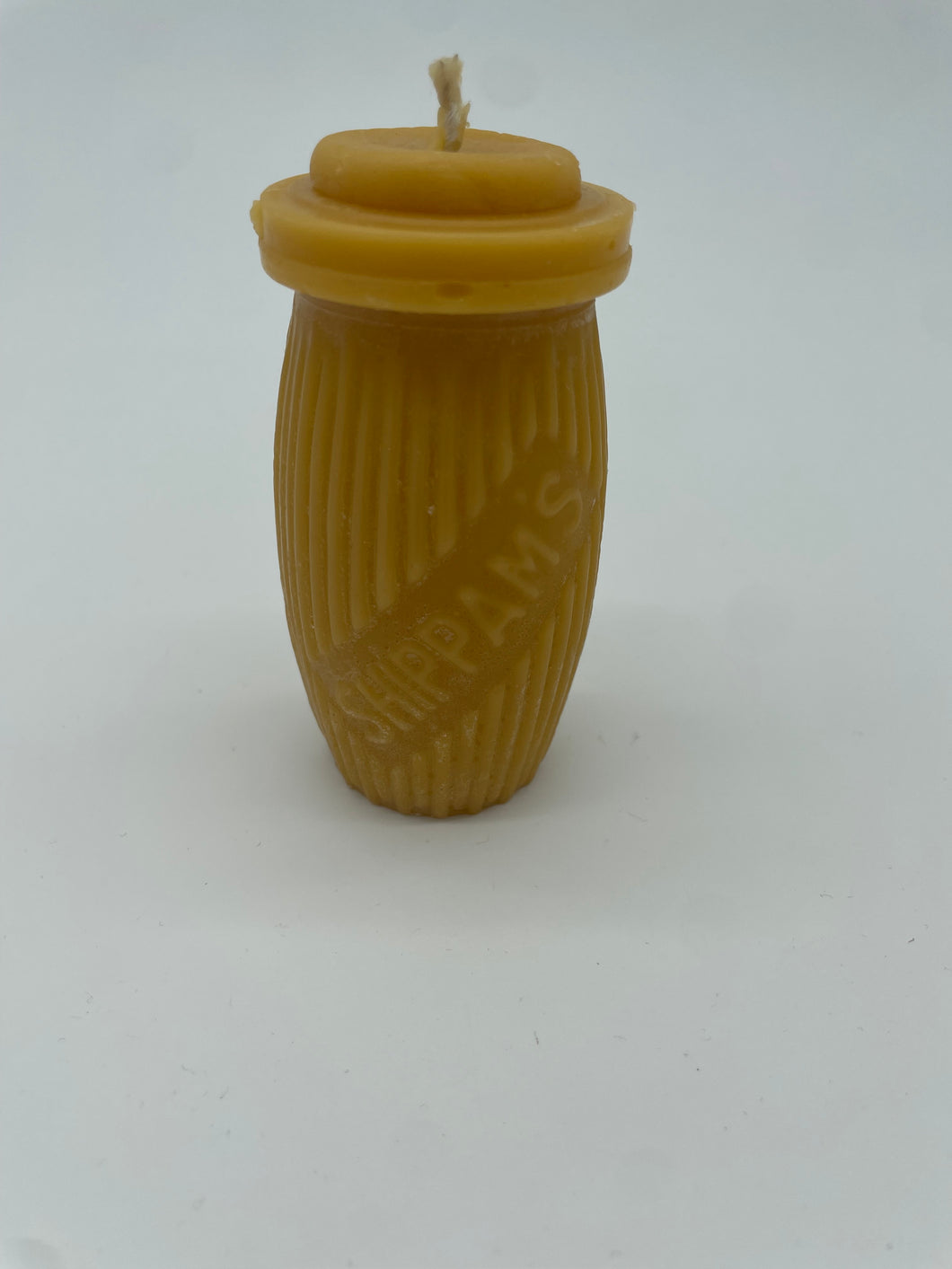 Candle shaped in a Shippam's Jar